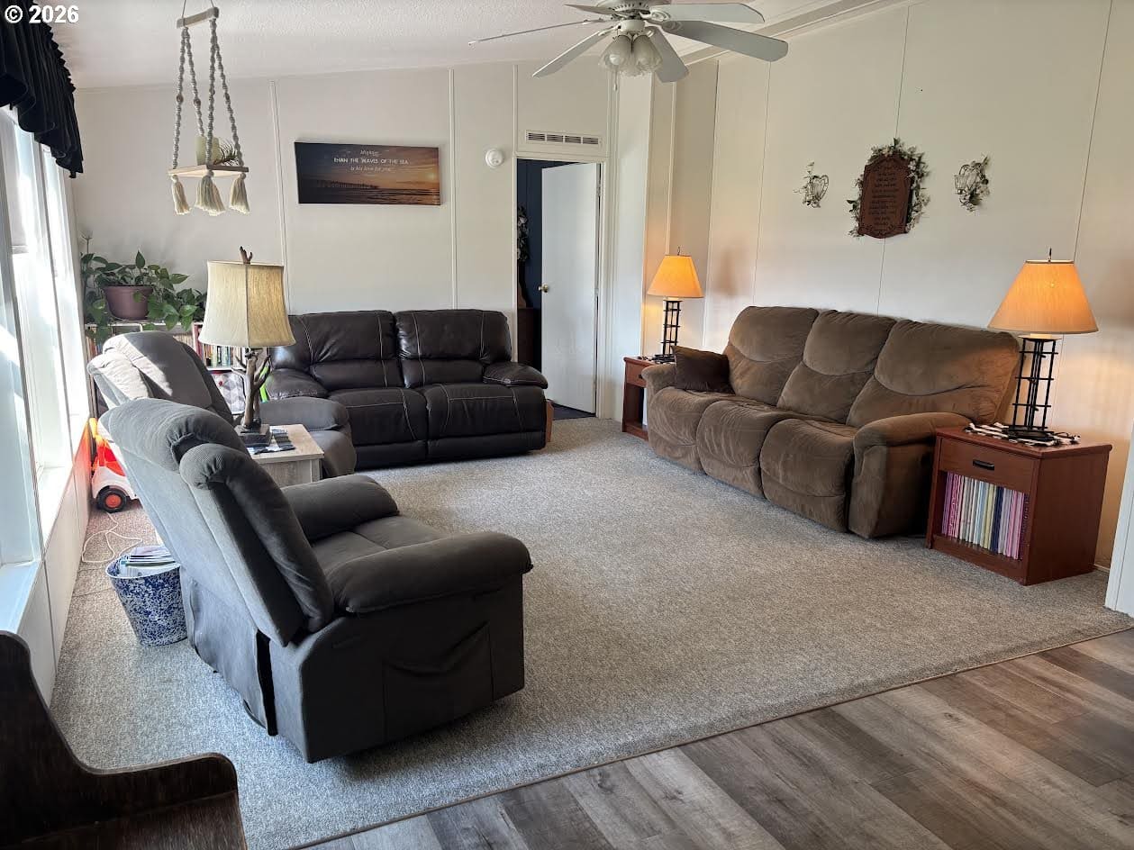 Cozy living room with comfortable seating arrangement.