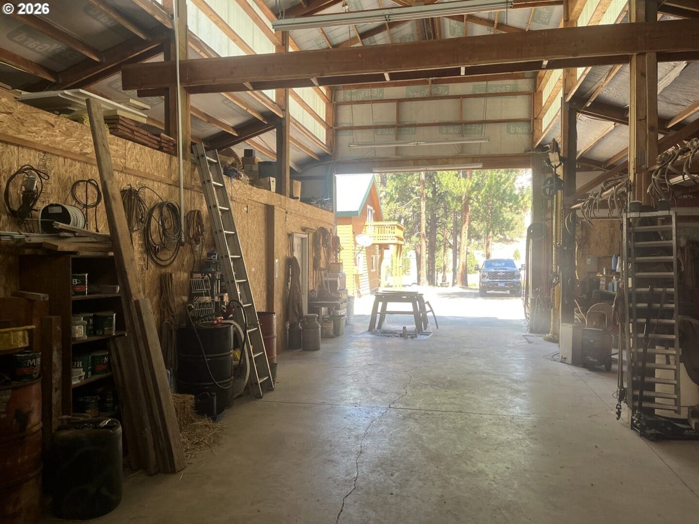 Spacious workshop with tools and equipment visible.